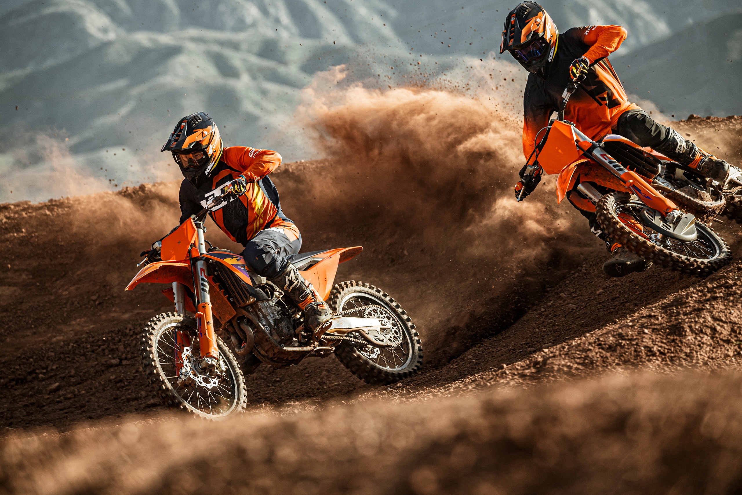Motocross riders on track
